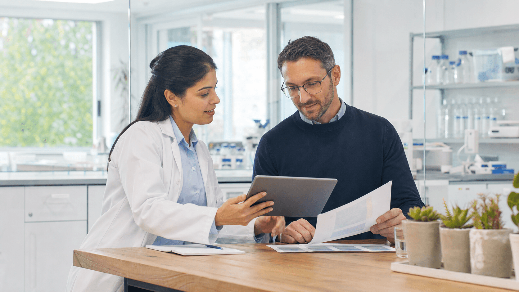 Scientist discussing a customized peptide project with a customer